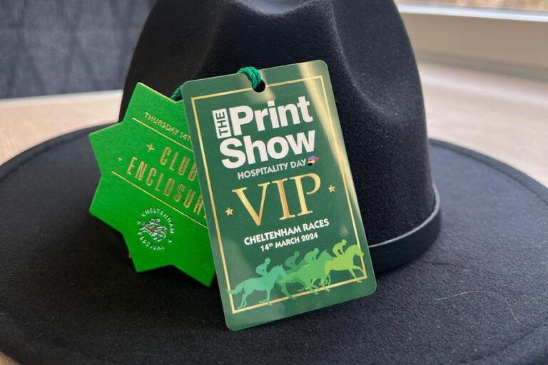 VIP ticket for Cheltenham Racecourse St Patricks day race day attached to black felt fedora