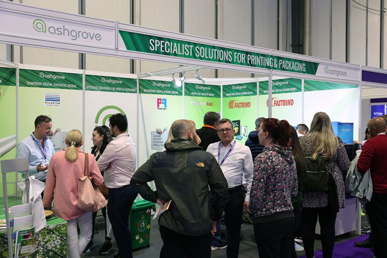 A busy corridor full of visitors to The Print Show, a UK-based print exhibition held in the NEC, Birmingham